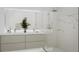 Modern bathroom with double vanity and marble shower at 1305 4Th St # 502D, Sarasota, FL 34236