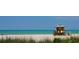 Peaceful beach scene with lifeguard stand and ocean view at 1305 4Th St # 502D, Sarasota, FL 34236