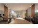 State-of-the-art fitness center with wood flooring and equipment at 1305 4Th St # 502D, Sarasota, FL 34236