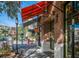 Retail building with red awning on a city street at 1305 4Th St # 502D, Sarasota, FL 34236