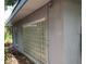 Exterior wall with glass block windows at 5023 Inverness Dr, Sarasota, FL 34243