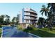 Modern three-story building with balconies and attached garage at 1150 Windsong Ln # 300, Sarasota, FL 34242
