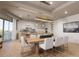 Open concept dining area and modern kitchen at 1150 Windsong Ln # 400, Sarasota, FL 34242