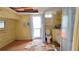 Bathroom featuring a toilet, sink, shower, window, and air conditioning unit at 10315 Cortez W Rd # 55-2, Bradenton, FL 34210