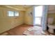 Bathroom featuring a toilet, sink, shower, window, and air conditioning unit at 10315 Cortez W Rd # 55-2, Bradenton, FL 34210