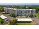Aerial view of condo building, highlighting a specific unit at 4440 Ironwood Cir # 108D, Bradenton, FL 34209