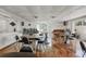 Community room featuring tables, chairs, and hardwood floors at 4440 Ironwood Cir # 108D, Bradenton, FL 34209
