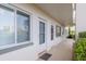Condo hallway with access to unit, featuring a clean and well-maintained appearance at 4440 Ironwood Cir # 108D, Bradenton, FL 34209