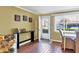 Bright living room with hardwood floors and access to patio at 4440 Ironwood Cir # 108D, Bradenton, FL 34209