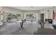 Community room with tables, chairs, and pool view at 4440 Ironwood Cir # 108D, Bradenton, FL 34209