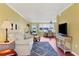 Open living area with dining space and hardwood floors at 4440 Ironwood Cir # 108D, Bradenton, FL 34209