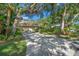 Beautiful home exterior with lush landscaping at 4560 Forest Wood Trl # 16, Sarasota, FL 34241