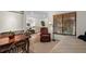Small dining area with table and chairs, view of living room at 4560 Forest Wood Trl # 16, Sarasota, FL 34241