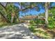 Lovely house exterior with a long driveway at 4560 Forest Wood Trl # 16, Sarasota, FL 34241