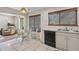 Kitchen with breakfast nook, white cabinets, and black appliances at 4560 Forest Wood Trl # 16, Sarasota, FL 34241
