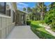 Private patio with access to the screened porch and backyard at 4560 Forest Wood Trl # 16, Sarasota, FL 34241