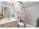 Clean bathroom with shower/tub combo, vanity, and toilet at 4560 Forest Wood Trl # 16, Sarasota, FL 34241
