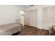 Small bedroom with a bed and ample closet space at 4560 Forest Wood Trl # 16, Sarasota, FL 34241