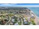 Aerial view of the property, showing its location near beach and other homes at 701 Armada S Rd, Venice, FL 34285