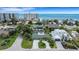 Aerial view of a house in a neighborhood near the ocean at 701 Armada S Rd, Venice, FL 34285