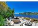 Community fire pit with seating; overlooks a tranquil waterway at 379 Aruba Cir # 202, Bradenton, FL 34209