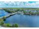 Aerial view of waterfront community with homes and lush landscaping at 379 Aruba Cir # 202, Bradenton, FL 34209