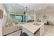 Open concept kitchen with island and living room view at 379 Aruba Cir # 202, Bradenton, FL 34209