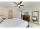 Main bedroom with a king bed and access to a second bedroom at 379 Aruba Cir # 202, Bradenton, FL 34209