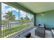 Relaxing screened balcony overlooking a picturesque lake at 379 Aruba Cir # 202, Bradenton, FL 34209