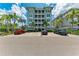 Come Monday building exterior with parking at 379 Aruba Cir # 202, Bradenton, FL 34209