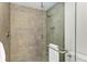 Large walk-in shower with neutral tile and modern fixtures at 379 Aruba Cir # 202, Bradenton, FL 34209