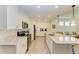 Modern kitchen boasting granite countertops and stainless steel appliances at 379 Aruba Cir # 202, Bradenton, FL 34209