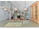Open kitchen features a granite countertop island, stainless steel appliances, and light wood cabinetry at 6800 Placida Rd # 281, Englewood, FL 34224