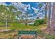 Relaxing community view with pond, fountain, and bench at 6800 Placida Rd # 281, Englewood, FL 34224