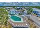 Community pool with plenty of lounge chairs for relaxing at 6800 Placida Rd # 281, Englewood, FL 34224