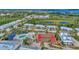 Aerial view showing community amenities including tennis courts and pool at 6800 Placida Rd # 281, Englewood, FL 34224