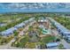 Aerial view of community featuring a pool and tennis courts at 6800 Placida Rd # 281, Englewood, FL 34224