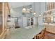 Kitchen with light wood cabinets and granite countertops at 6800 Placida Rd # 281, Englewood, FL 34224
