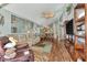 Relaxing living room with hardwood floors, neutral decor and comfortable seating at 6800 Placida Rd # 281, Englewood, FL 34224