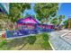 Pink building with blue trim and patio at 6800 Placida Rd # 281, Englewood, FL 34224