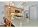 Kitchen with stainless steel appliances and light wood cabinets at 6800 Placida Rd # 281, Englewood, FL 34224