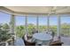 Enjoy breathtaking nature views from this screened balcony with outdoor seating at 409 N Point Rd # 501, Osprey, FL 34229