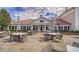 Patio with tables, umbrellas, and heaters near clubhouse at 409 N Point Rd # 501, Osprey, FL 34229