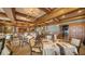 Formal dining room with wood beams and plush carpeting at 409 N Point Rd # 501, Osprey, FL 34229