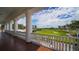 Brick balcony overlooking a lush golf course at 409 N Point Rd # 501, Osprey, FL 34229
