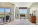 Bedroom with large windows offering scenic views and ample natural light at 409 N Point Rd # 501, Osprey, FL 34229
