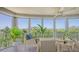 Spacious screened balcony with ample seating and breathtaking views at 409 N Point Rd # 501, Osprey, FL 34229