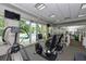Fitness center with cardio and weight machines; views of the pool at 409 N Point Rd # 501, Osprey, FL 34229