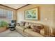 Relaxing living room with a comfortable sofa and neutral color scheme at 409 N Point Rd # 501, Osprey, FL 34229