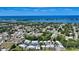 Aerial view of waterfront community with homes and a pool at 16450 Gloria Ln # 105, Nokomis, FL 34275